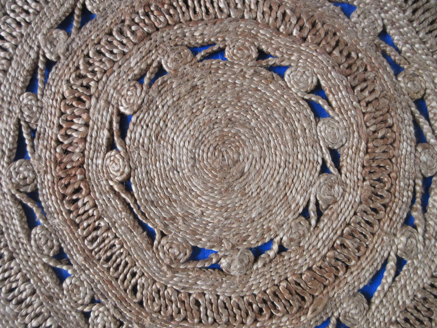 Handwoven jute rug with a beautiful, circular pattern of natural Rug any room.